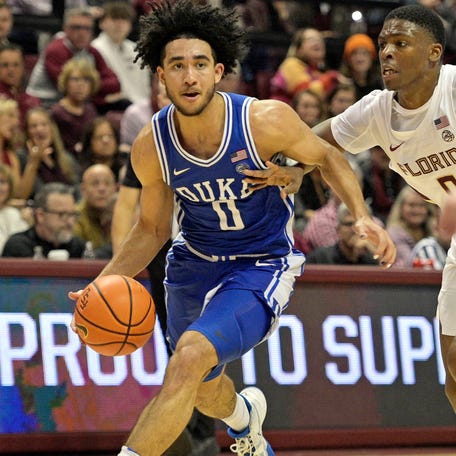 Duke guard Jared McCain (0) drives the ball to the net past Florida State guard Chandler Jackson (0) during the second half at Donald L. Tucker Center.