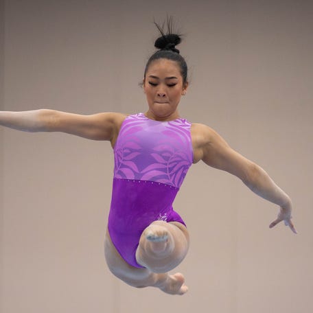 Sunisa Lee warms up on the balance beam for the Winter Cup competition on Friday, Feb. 23, 2024.