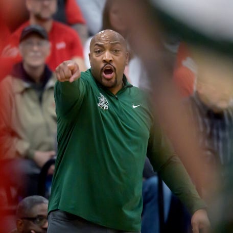 Richwoods head coach William Smith shouts out instructions to his players as they battle Morton in the second half of their Class 3A regional basketball title game Friday, Feb. 23, 2024 at Limestone High School in Bartonville. Richwoods advanced to the sectionals with a 56-53 win.