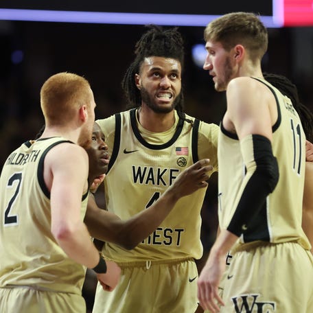 Wake Forest Demon Deacons forward Efton Reid III (4) reacts in the huddle during the first half against the Duke Blue Devils at Lawrence Joel Veterans Memorial Coliseum.
