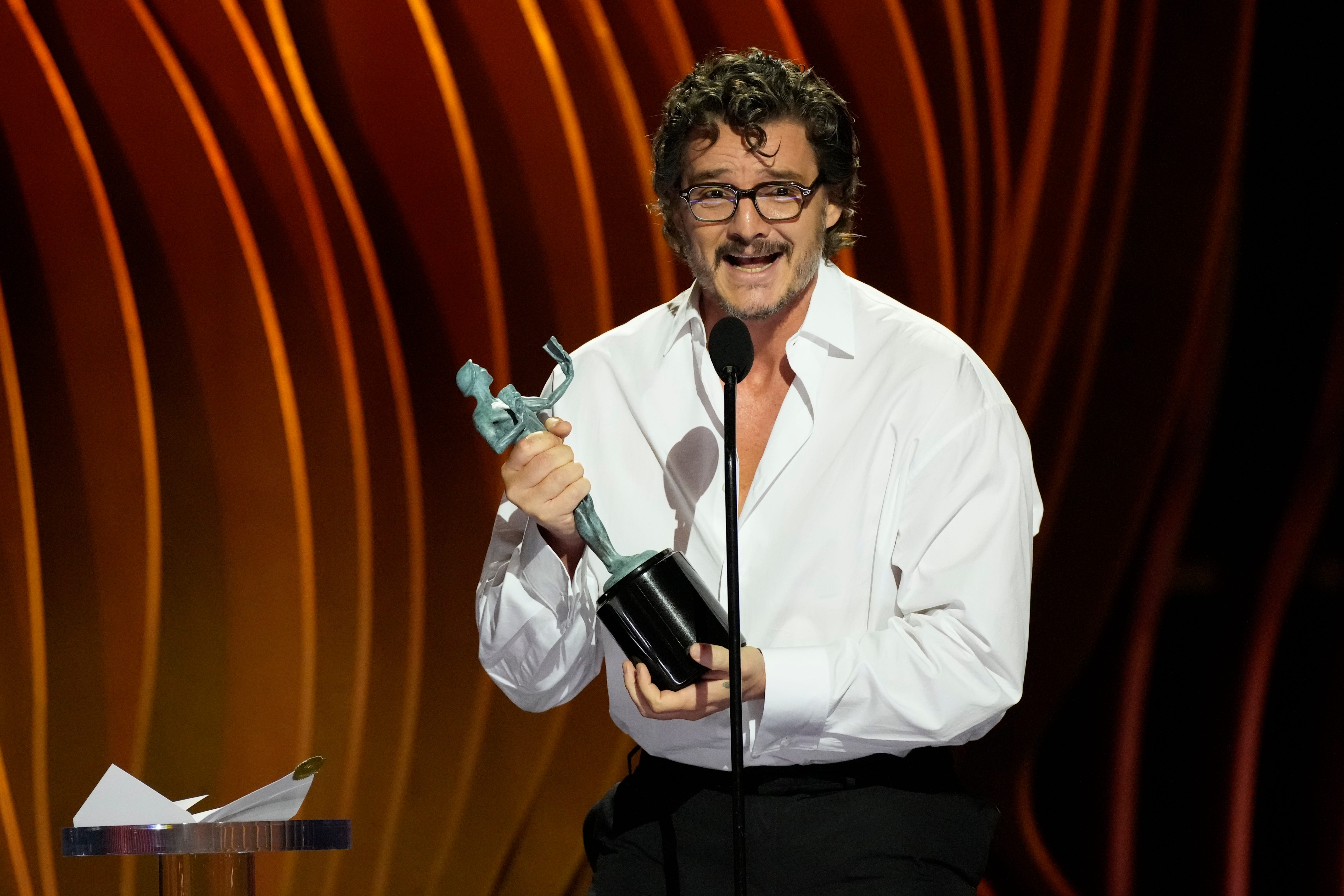 Pedro Pascal accepts the award for outstanding performance by a male actor in a drama series during the Screen Actors Guild Awards on Saturday, Feb. 24, 2024 at The Shrine Auditorium and Expo Hall in Los Angeles.