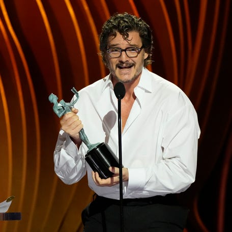 Pedro Pascal accepts the award for outstanding performance by a male actor in a drama series during the Screen Actors Guild Awards on Saturday, Feb. 24, 2024 at The Shrine Auditorium and Expo Hall in Los Angeles.