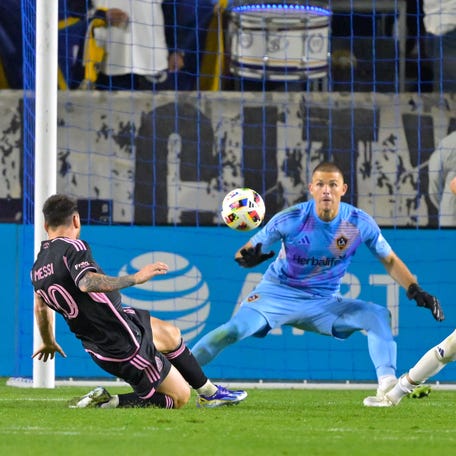 Feb. 25: Inter Miami's Lionel Messi (10) scores the late equalizing goal beyond Los Angeles Galaxy goalkeeper John McCarthy during the second half at Dignity Health Sports Park. The game ended in a 1-1 tie.