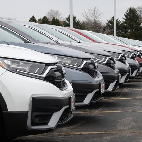 ELGIN, ILLINOIS - MARCH 25: Cars sit on the lot at the McGrath Honda dealership on March 25, 2021 in Elgin, Illinois. COVID related plant shutdowns over the past year, computer chip shortages, inclement weather, backups at shipping ports and strong demand have combined to cause shortages of new vehicles at dealerships across the country. . (Photo by Scott Olson/Getty Images)