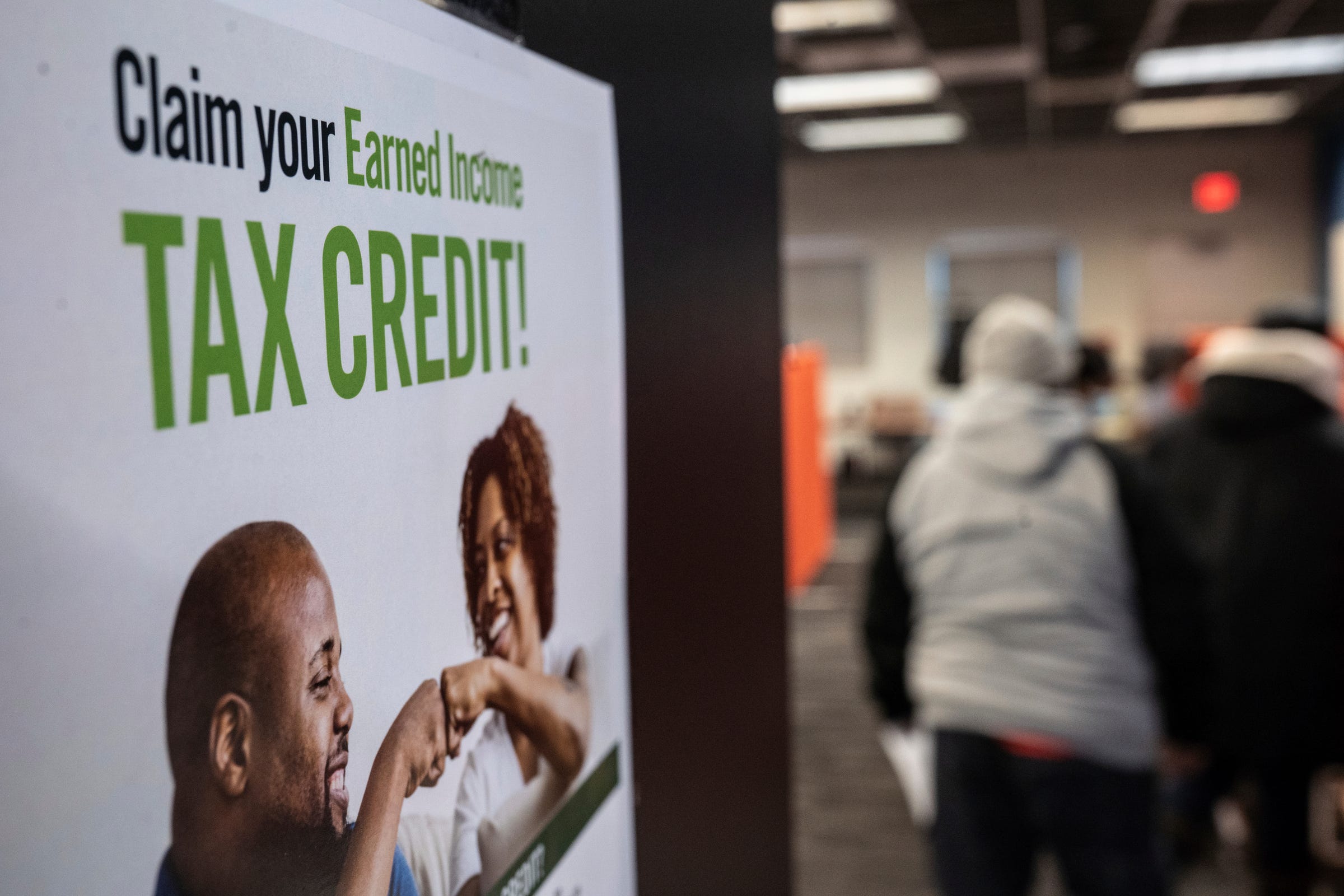 Michigan taxpayers find it hard to track the status of their refunds early in the 2024 tax season. Supplemental checks are being issued for an expanded state earned income tax credit in 2022, triggering questions. File photo: Sign at tax help site in Detroit in 2023.