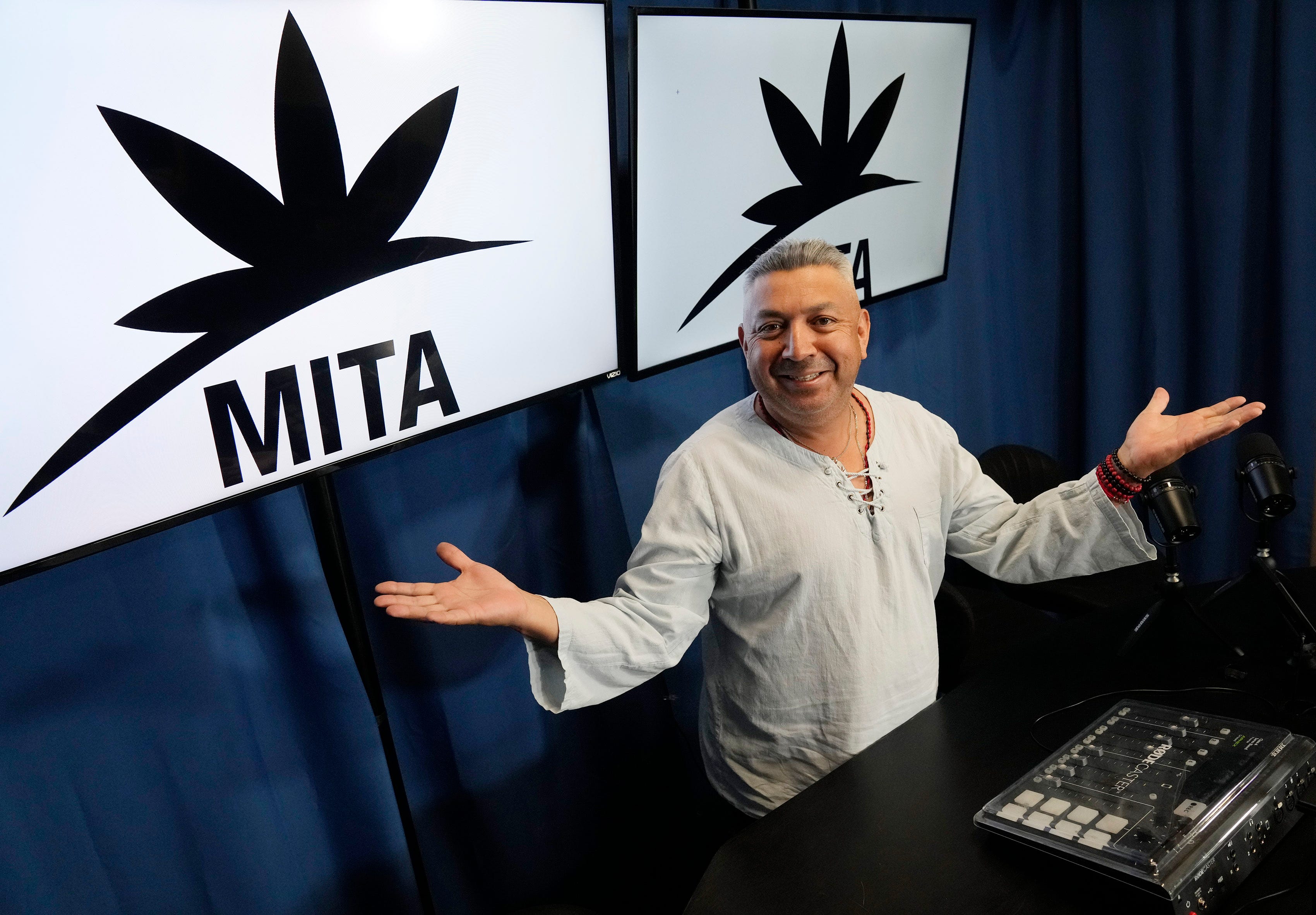 Demitri Downing, director of the Marijuana Industry Trade Association, stands inside his Tempe office on Feb. 26, 2024.