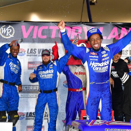 Mar 1, 2024; Las Vegas, Nevada, USA; NASCAR Truck Series driver Rajah Caruth (71) celebrates his victory of the Victorias Voice Foundation 200 at Las Vegas Motor Speedway. Mandatory Credit: Gary A. Vasquez-USA TODAY Sports