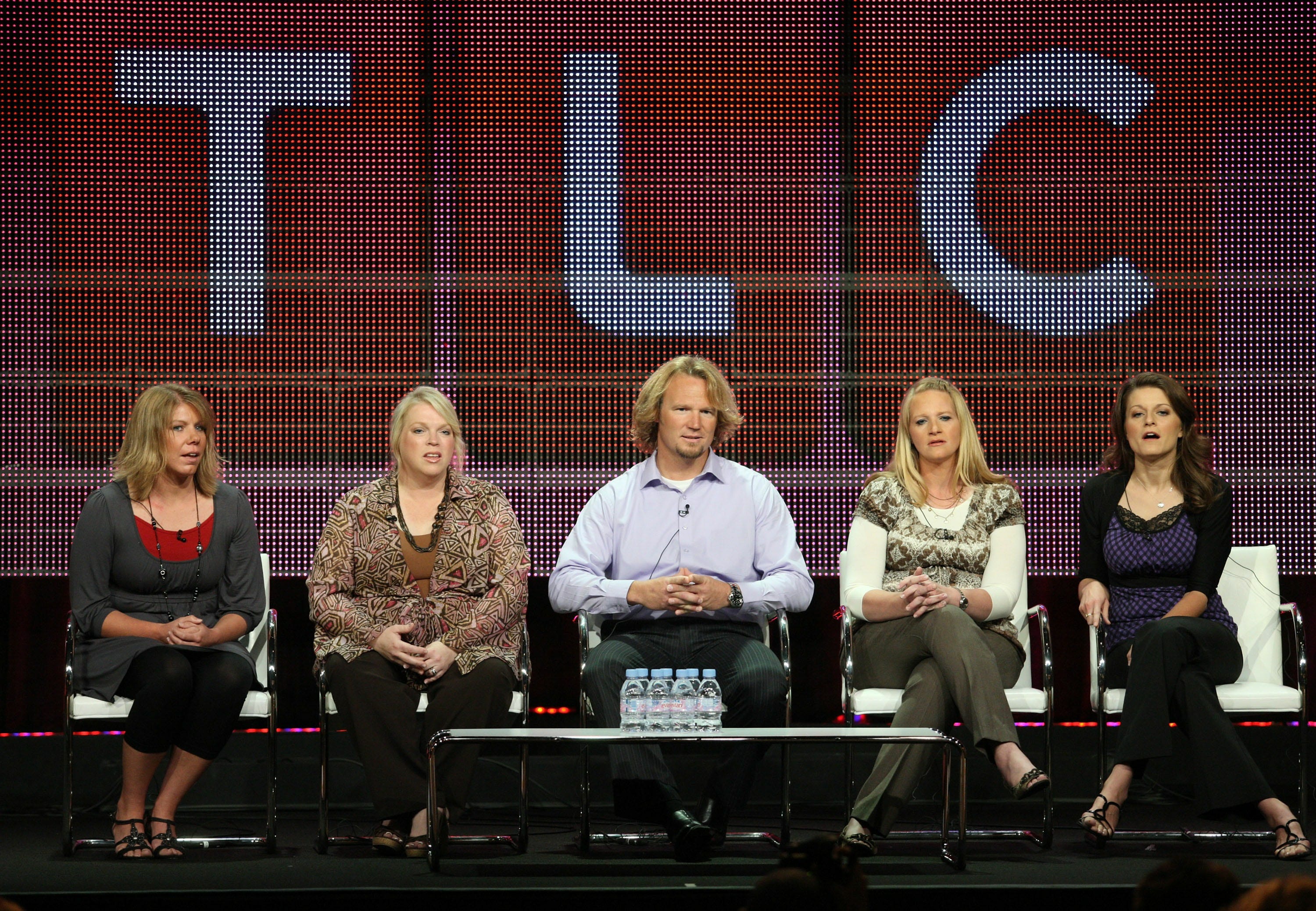 TV personalities Meri Brown (left), Janelle Brown, Kody Brown, Christine Brown and Robyn Brown speak during the "Sister Wives" panel during the Discovery Communications portion of the 2010 Summer TCA press tour at the Beverly Hilton Hotel on Aug. 6, 2010, in Beverly Hills, California.