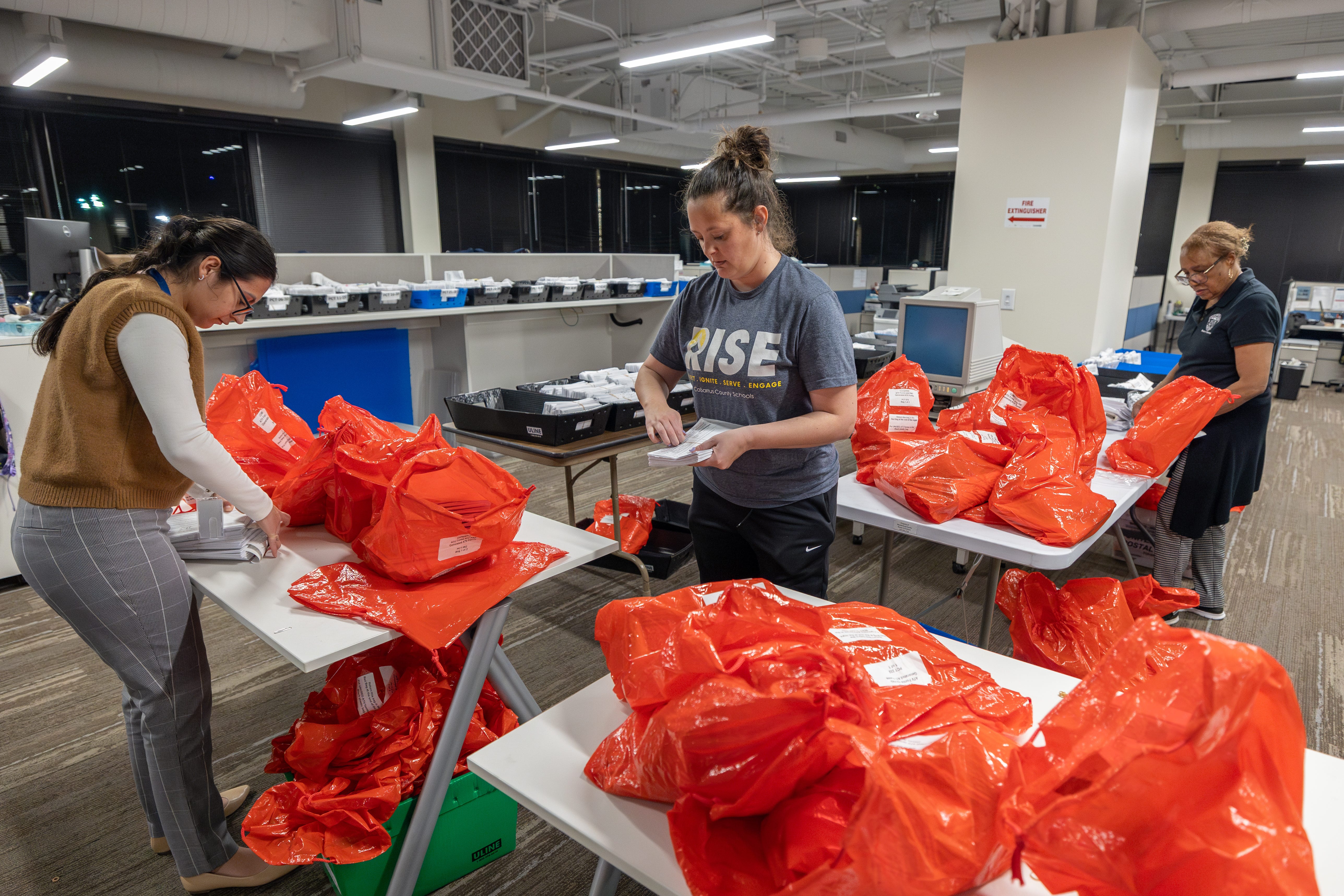 CHARLOTTE, NORTH CAROLINA - MARCH 5: Staff and volunteers receive electronically-stored ballots and other polling material dropped at the Mecklenburg County Board of Elections after polls close during Super Tuesday on March 5, 2024 in Charlotte, United States. 15 States and one U.S. Territory are holding their primary elections on Super Tuesday, awarding more delegates than any other day in the presidential nominating calendar. (Photo by Grant Baldwin/Getty Images)   ORG XMIT: 776052293 ORIG FILE ID: 2054046360