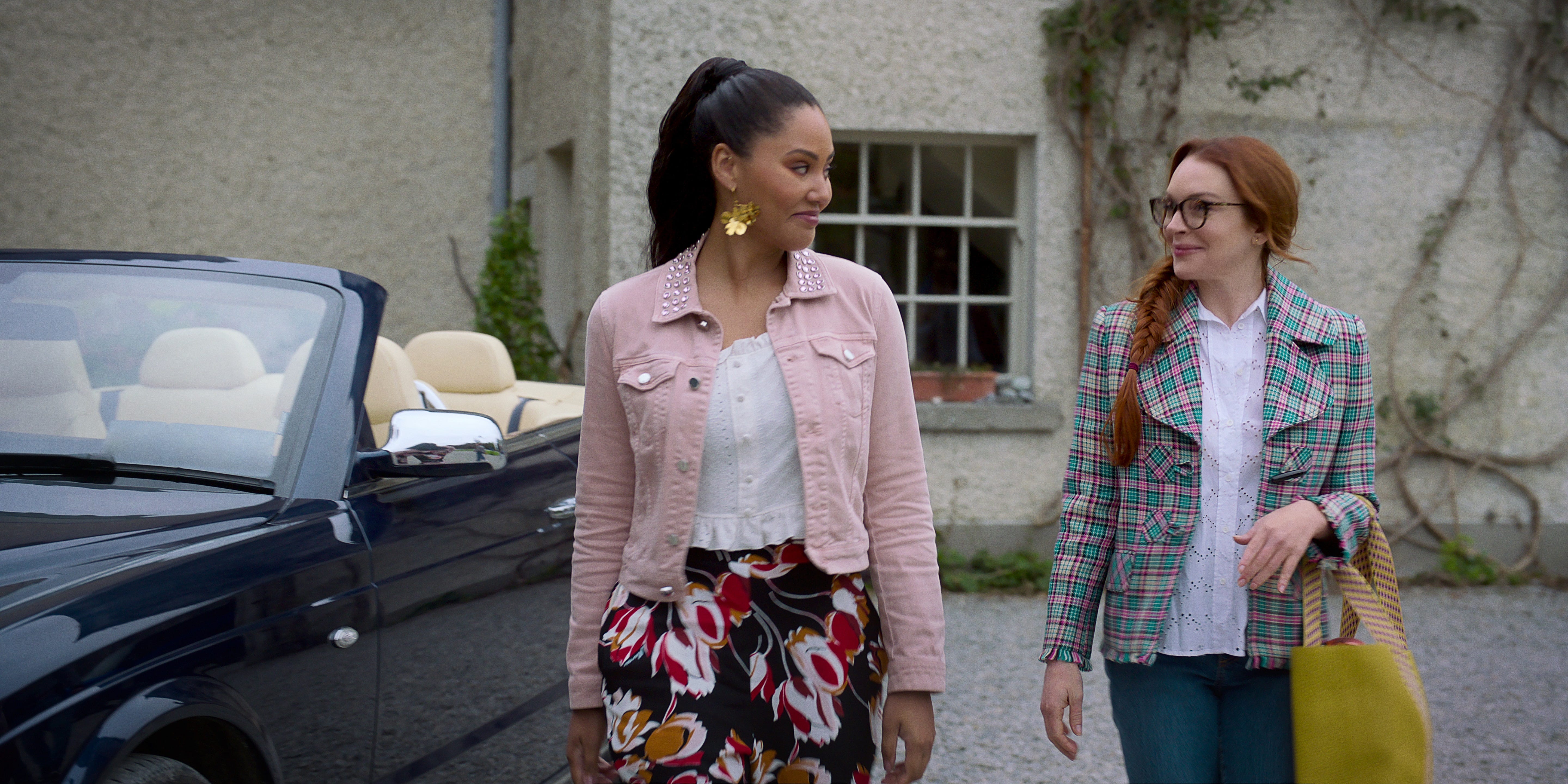 Lindsay Lohan, an executive producer on "Irish Wish," helped her friend and co-star Ayesha Curry get back into acting.