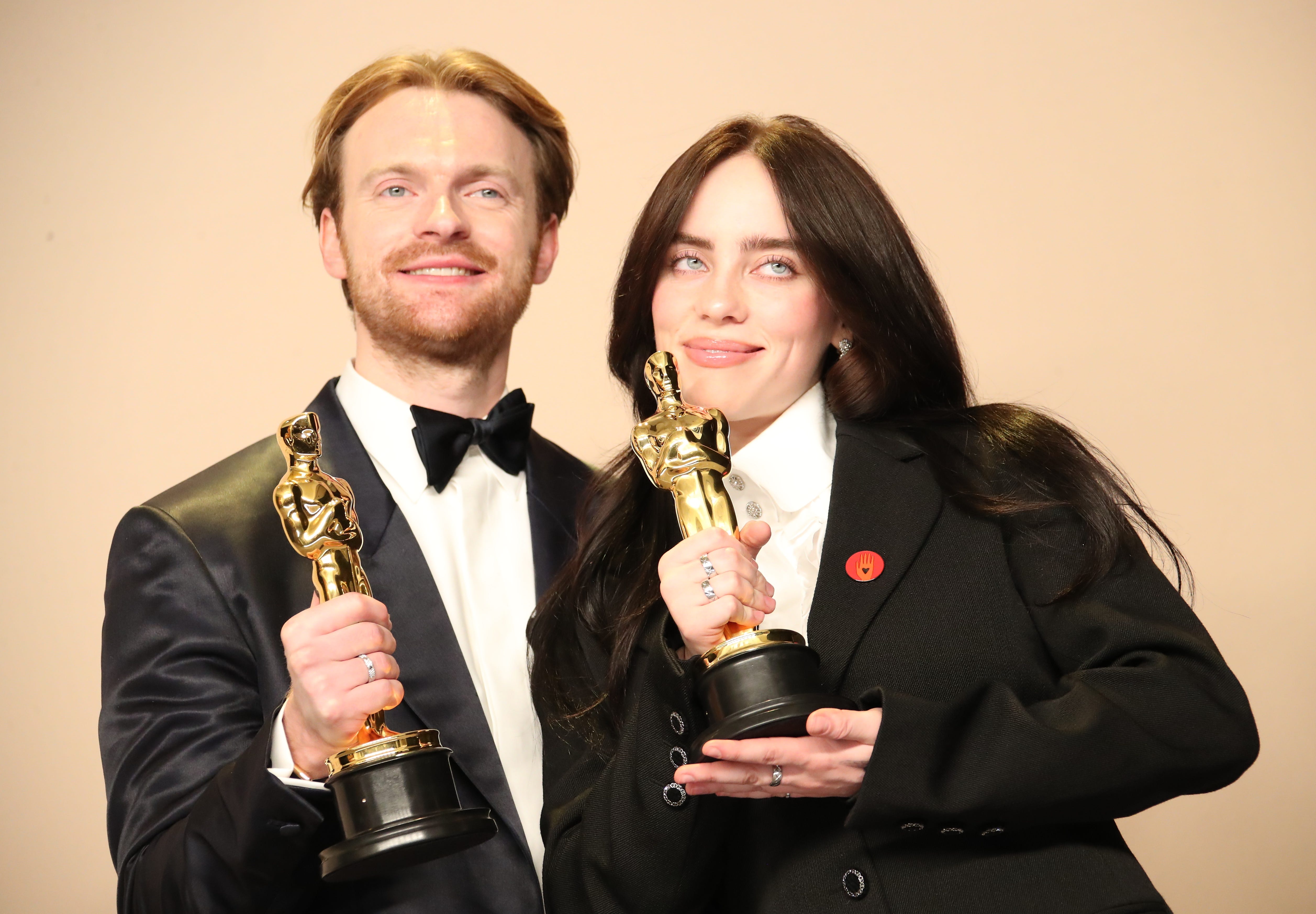 Mar 10, 2024; Los Angeles, CA, USA; (L-R) Finneas O'Connell and Billie Eilish, winners of Best Original Song award for 'What Was I Made For?' from 'Barbie,' at the 96th Oscars at the Dolby Theatre at Ovation Hollywood in Los Angeles on Sunday, March 10, 2024. Mandatory Credit: Dan MacMedan-USA TODAY ORG XMIT: USAT-872355 ORIG FILE ID: 20240310_ft2_nbr_819.JPG