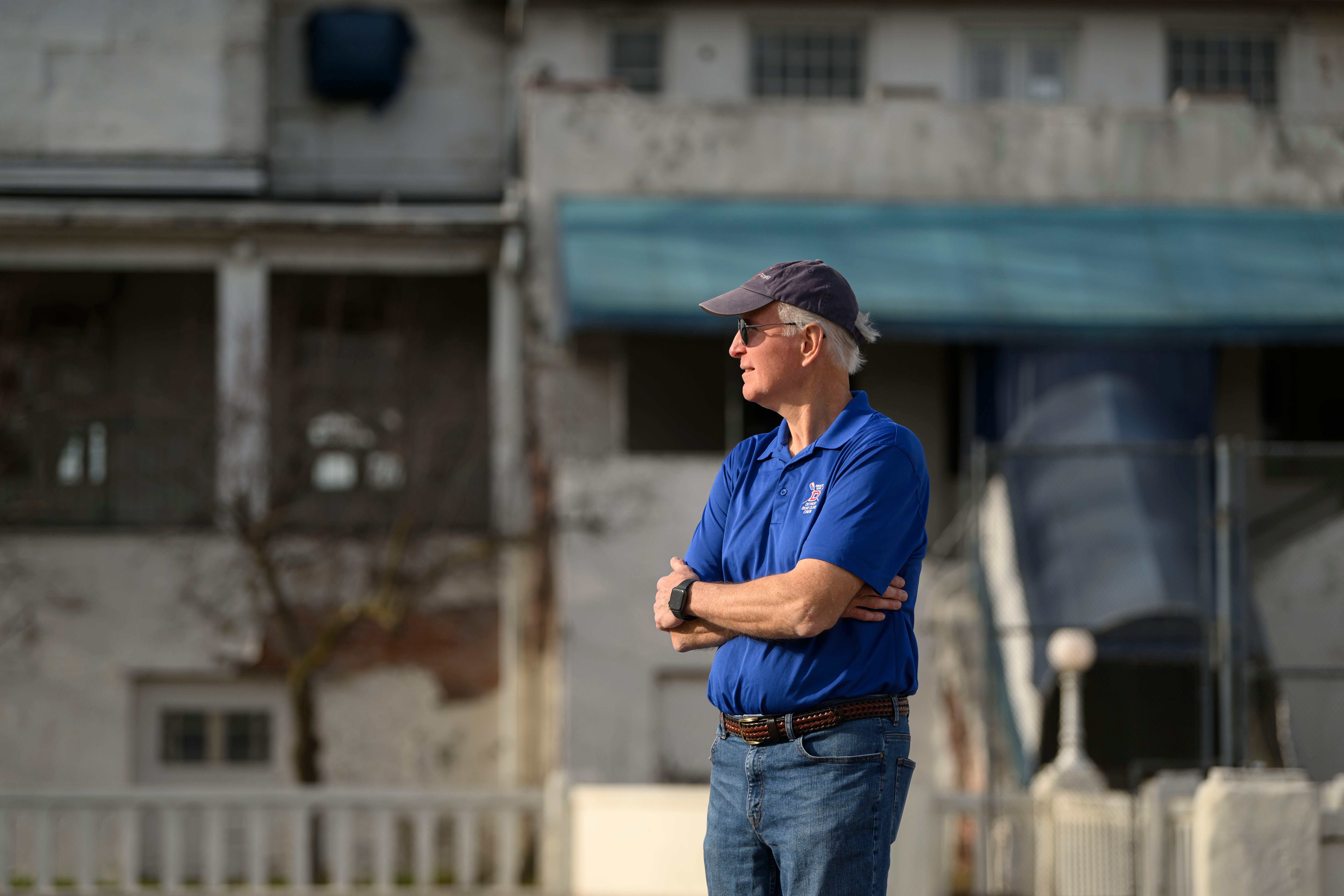 Henry Goitz, president of the Friends of Detroit Rowing, stands in front of the Belle Isle Boathouse on March 12, 2024. "It has a significant history, and we're not here for the social aspects of running a business," Goitz said. "...This is a hallmark site off the island and, at the very least, a portion should be spared as a visitor center."