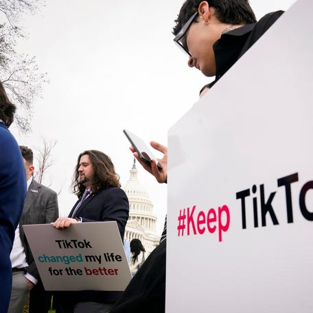 Protesters outside of the United States Capitol as the House voted and approved a bill Wednesday that would force TikTok's parent company to sell the popular social media app or face a practical ban in the U.S.