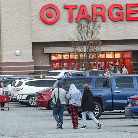 Customers come and go from Target store during Black Friday shopping on Nov. 23 in Anderson, S.C.