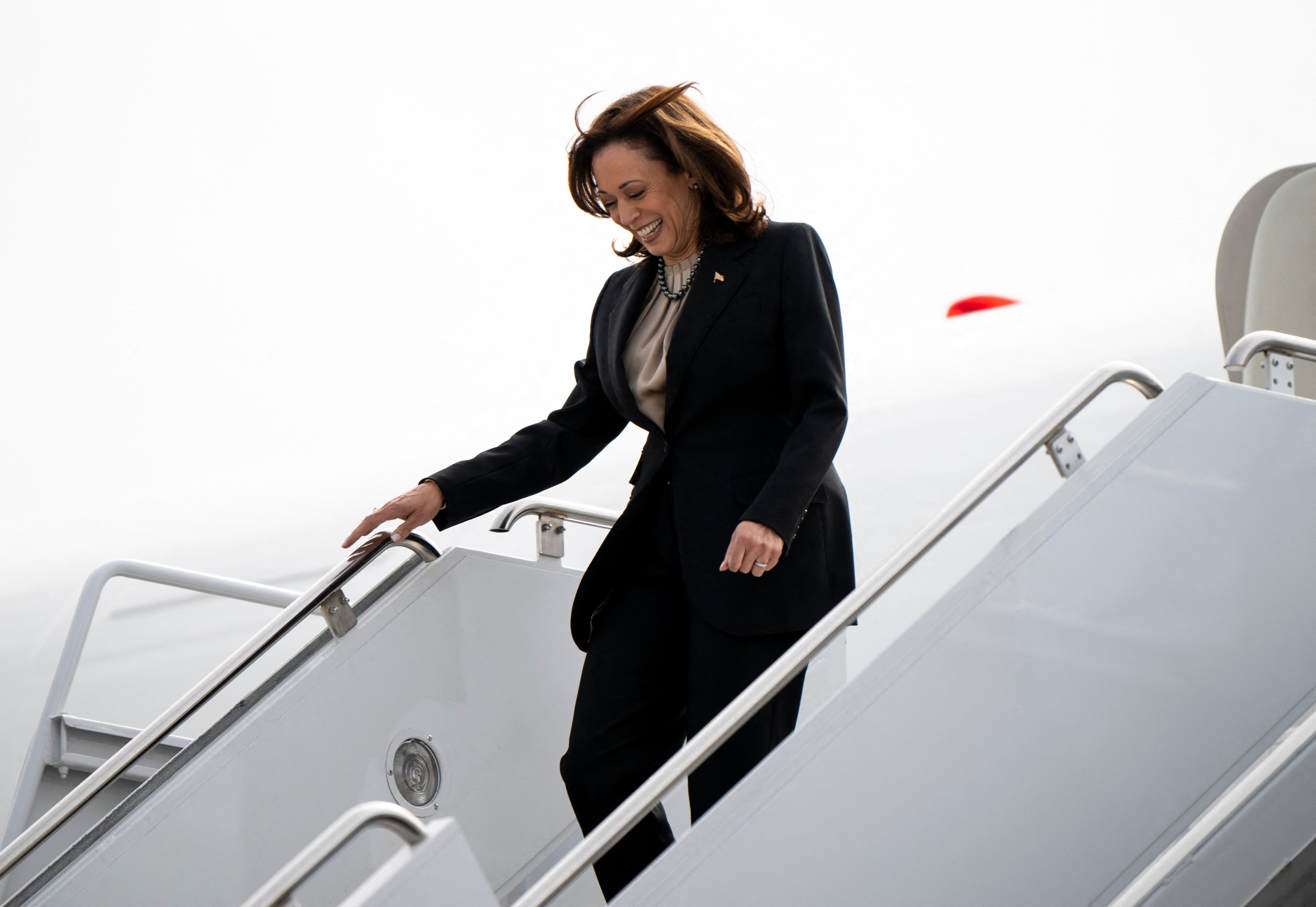 US Vice President Kamala Harris exits Air Force Two as arrives at the Minneapolis-St. Paul International Airport in St. Paul, Minnesota on March 14, 2024. (Photo by STEPHEN MATUREN / AFP) (Photo by STEPHEN MATUREN/AFP via Getty Images)