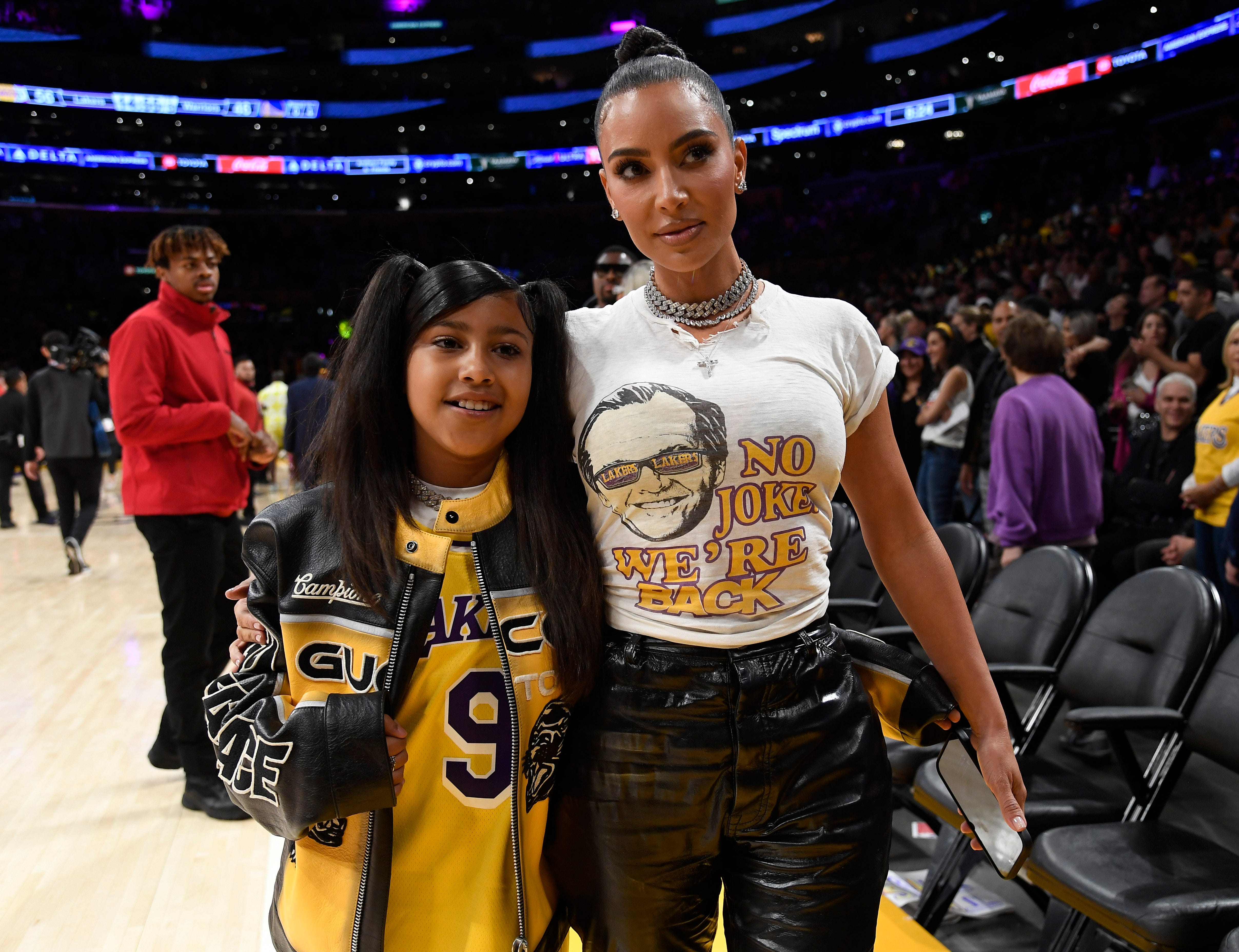 LOS ANGELES, CALIFORNIA - MAY 12: Kim Kardashian and daughter North West attend the Western Conference Semifinal Playoff game between the Los Angeles Lakers and Golden State Warriors at Crypto.com Arena on May 12, 2023 in Los Angeles, California. (Photo by Kevork Djansezian/Getty Images) ORG XMIT: 775977197 [Via MerlinFTP Drop]