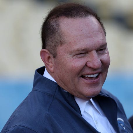 Agent Scott Boras, seen watching batting practice before Game 1 of the NLDS between the Los Angeles Dodgers and Arizona Diamondbacks at Dodger Stadium, still has high-profile players who are unsigned.