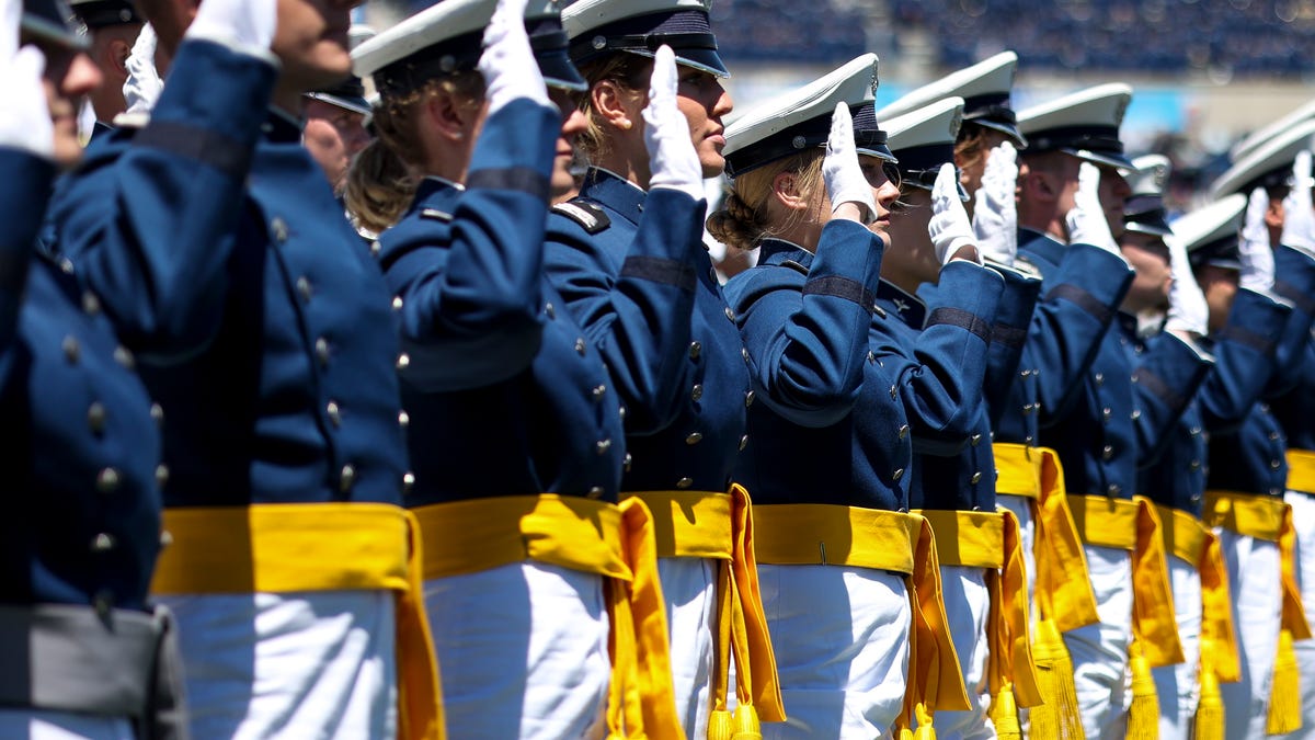 Air Force Academy cadets take their oath of office during the graduation ceremony May 25, 2022, in Colorado Springs, Colorado.