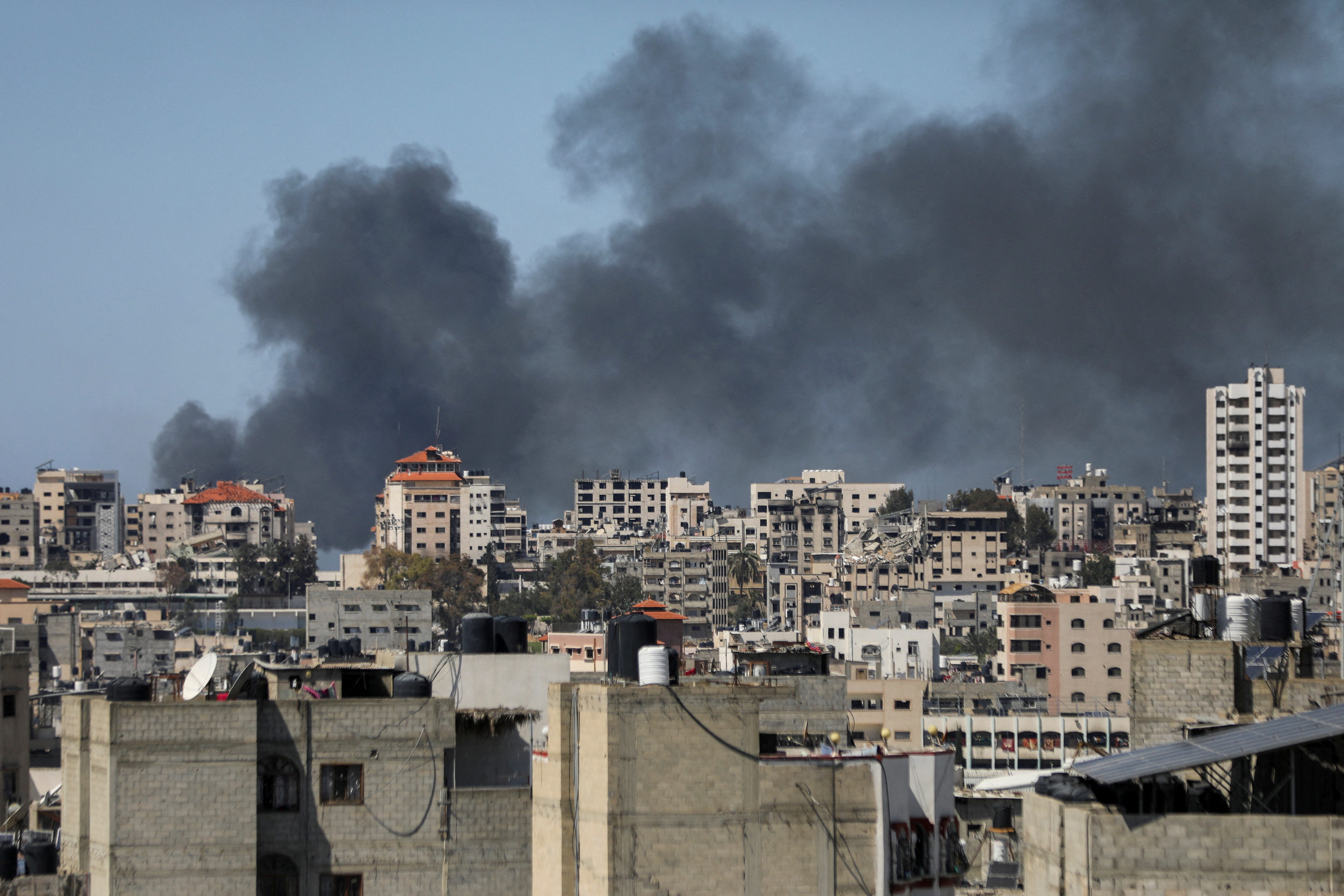 Smoke rises during an Israeli raid at Al-Shifa hospital and the area around it, amid the ongoing conflict between Israel and the Palestinian Islamist group Hamas, in Gaza City, March 20, 2024. REUTERS/Dawoud Abu Alkas.
