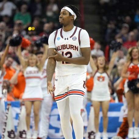 Auburn guard Denver Jones (12) reacts after a basket against Yale during the second half of their game in the first round of the 2024 NCAA men's tournament at Spokane Veterans Memorial Arena.