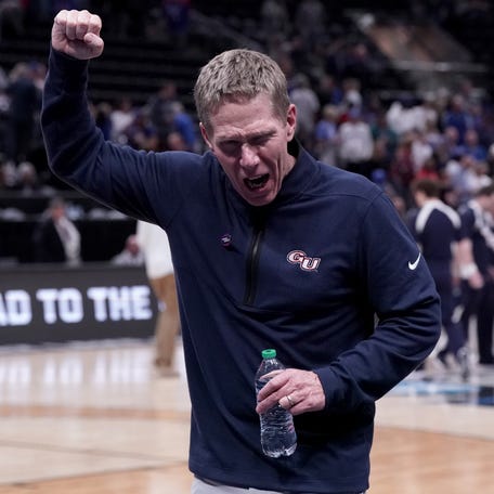 Gonzaga Bulldogs head coach Mark Few celebrates after defeating the Kansas Jayhawks in the second round of the 2024 NCAA Tournament at Vivint Smart Home Arena-Delta Center.