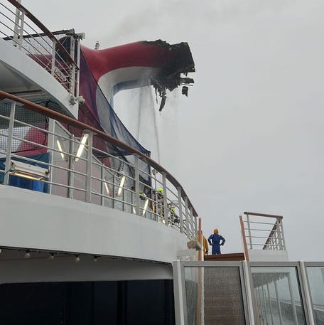 This photo shows the damage to the exhaust funnel on thre Carnival Freedom cruise ship caused by a fire on Saturday.