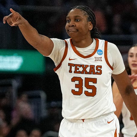 Texas forward Madison Booker celebrates a score during the game against Alabama.
