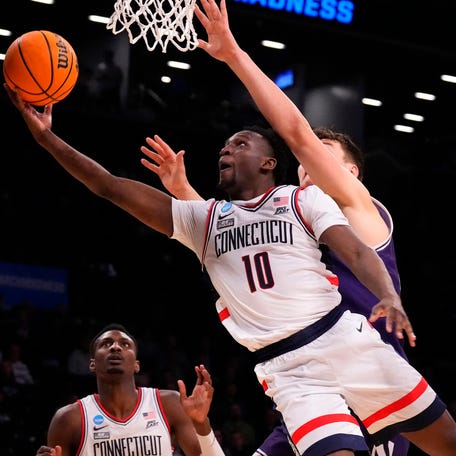 Connecticut guard Hassan Diarra (10) shoots the ball against Northwestern during the second round of the 2024 NCAA men's tournament at the Barclays Center.
