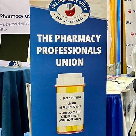 A banner for The Pharmacy Guild stands at a booth for the new union at the American Pharmacists Association annual conference in Orlando, Florida, on Sunday, March 24, 2024.