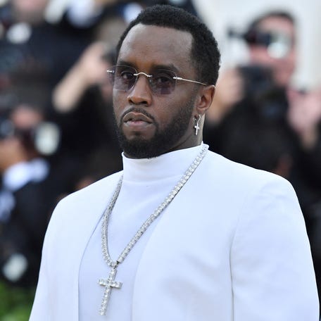 (FILES) Sean Combs 'P. Diddy' arrives for the 2018 Met Gala on May 7, 2018, at the Metropolitan Museum of Art in New York. Homes belonging to Sean "Diddy" Combs were being raided by federal agents, media reported on March 25, 2024, with the US hip hop mogul at the center of sex trafficking and sex assault lawsuits. (Photo by ANGELA WEISS / AFP) (Photo by ANGELA WEISS/AFP via Getty Images) ORIG FILE ID: 2105335149