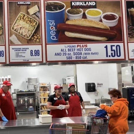 A customer places an order at the food court of the new Costco at One Daytona in Daytona, Florida, on the store's opening day, Feb. 22, 2024.