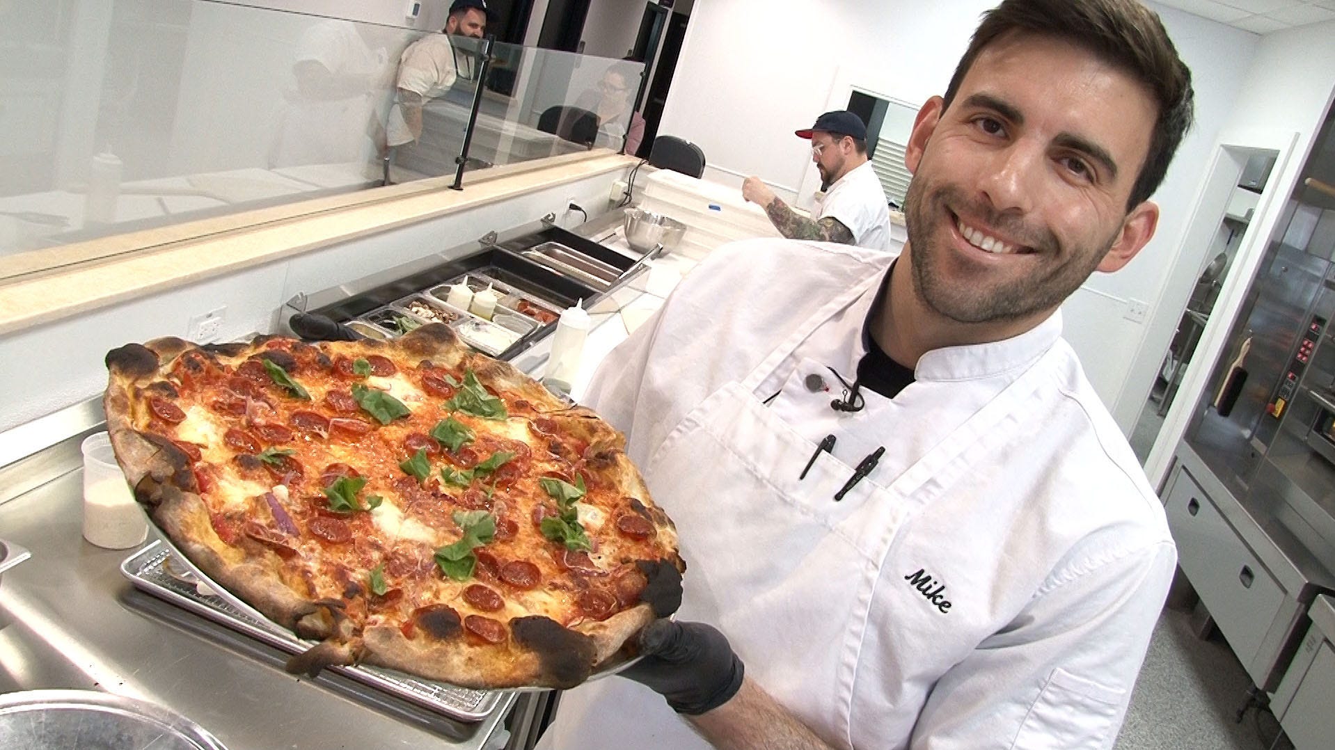 Mike Gallucci prepares pizza at his new Pizzeria 'Lucci in Belmar