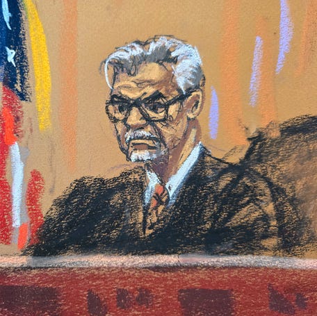 Justice Juan Merchan presides during a hearing before the trial of former President Donald Trump over charges that he falsified business records to conceal money paid to silence porn star Stormy Daniels in 2016, in Manhattan state court in New York City, March 25, 2024 in this courtroom sketch.