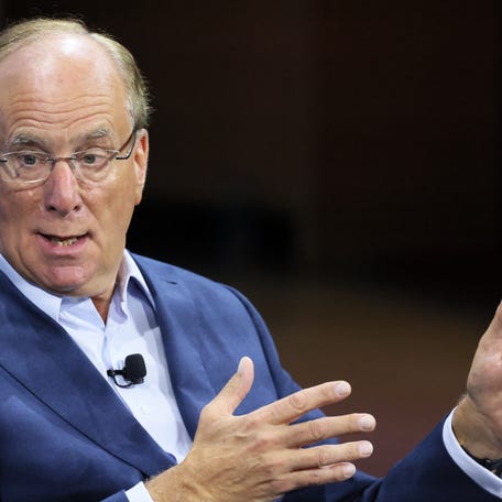 BlackRock CEO Larry Fink speaking with Andrew Ross Sorkin during the New York Times DealBook Summit in the Appel Room at the Jazz At Lincoln Center on November 30, 2022 in New York City. Fink issued a letter on March 26, 2024 calling on companies and policy makers to rethink retirement.