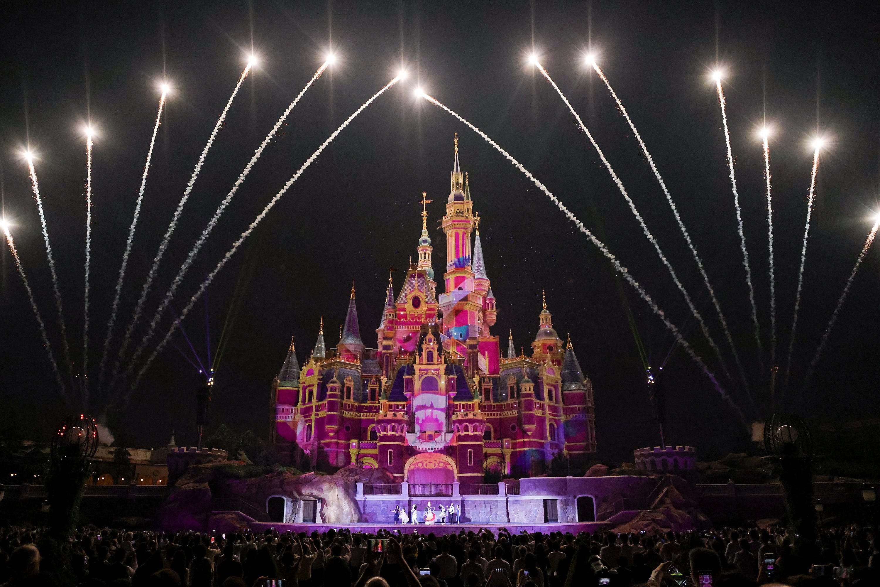 Fireworks explode over the Shanghai Disney Resort during the 5th anniversary celebration on June 15, 2021 in Shanghai, China.