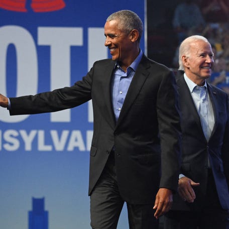 President Barack Obama and US President Joe Biden participate in a rally in support of Democratic US Senate candidate John Fetterman in Philadelphia, Pennsylvania, on November 5, 2022.
