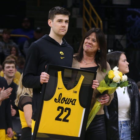 Patrick McCaffery, left, is pictured with his family during senior day on March 10. McCaffery is transferring.