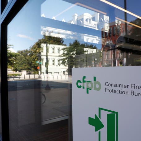 Signage is seen at the Consumer Financial Protection Bureau (CFPB) headquarters in Washington, D.C., U.S., August 29, 2020. REUTERS/Andrew Kelly