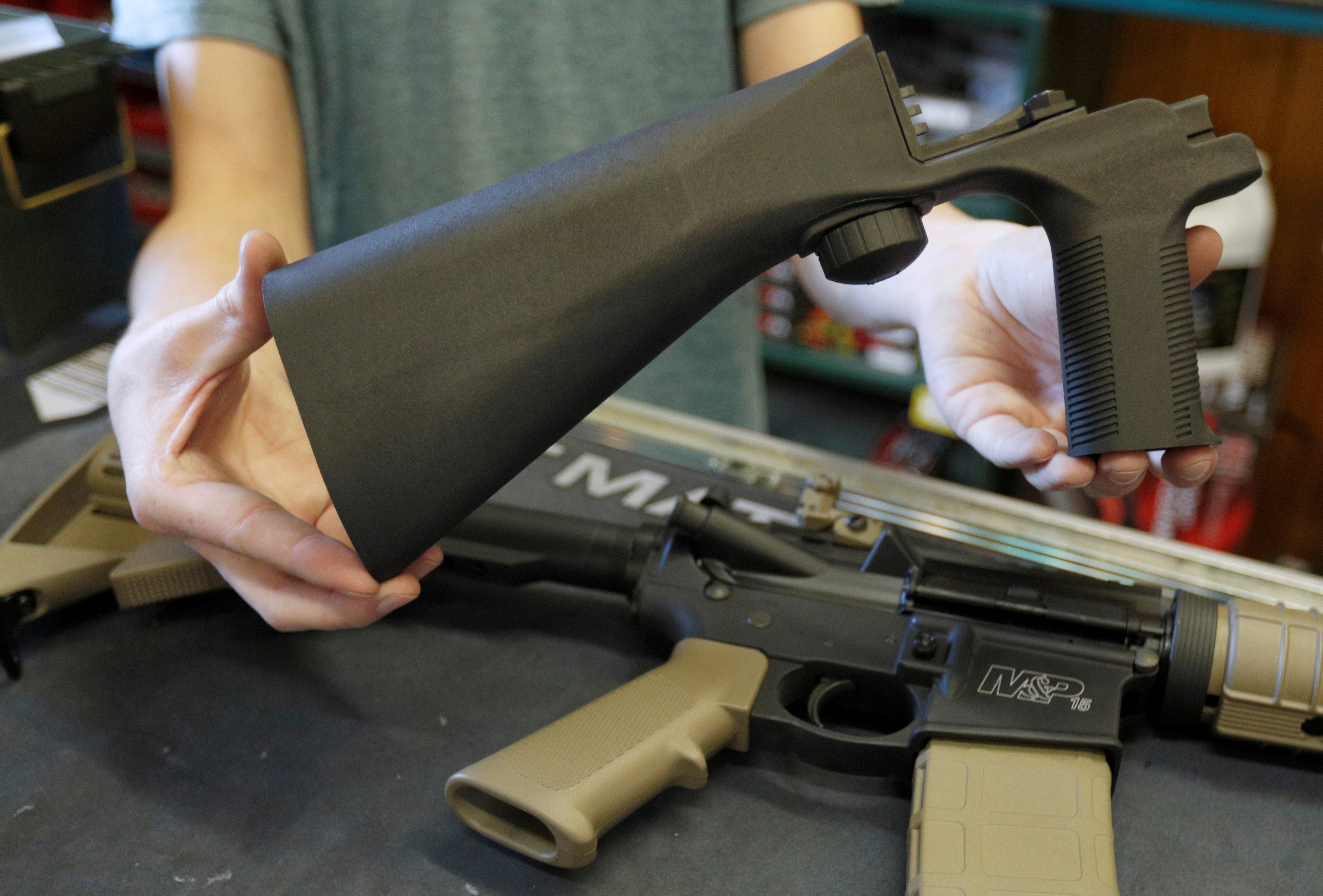 A bump fire stock that attaches to a semi-automatic rifle to increase the firing rate is seen at Good Guys Gun Shop in Orem, Utah, U.S., October 4, 2017.