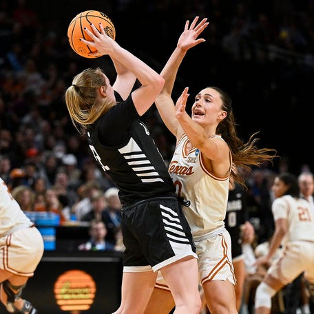 Mar 29, 2024; Portland, OR, USA; Texas Longhorns guard Shay Holle (10) puts half court pressure on Gonzaga Bulldogs guard Brynna Maxwell (22) during the first half in the semifinals of the Portland Regional of the 2024 NCAA Tournament at the Moda Center at the