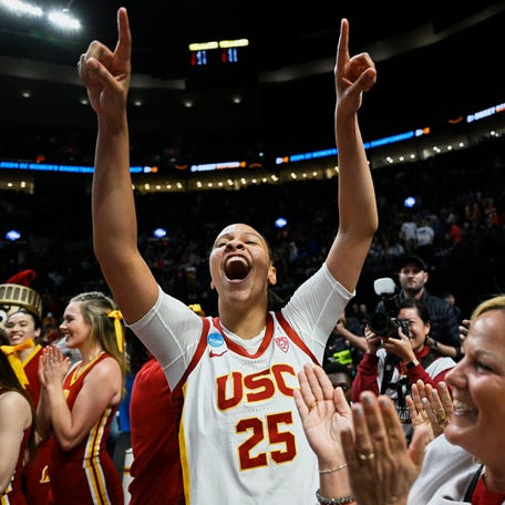 USC guard McKenzie Forbes celebrates the Trojans' Sweet 16 win over Baylor.