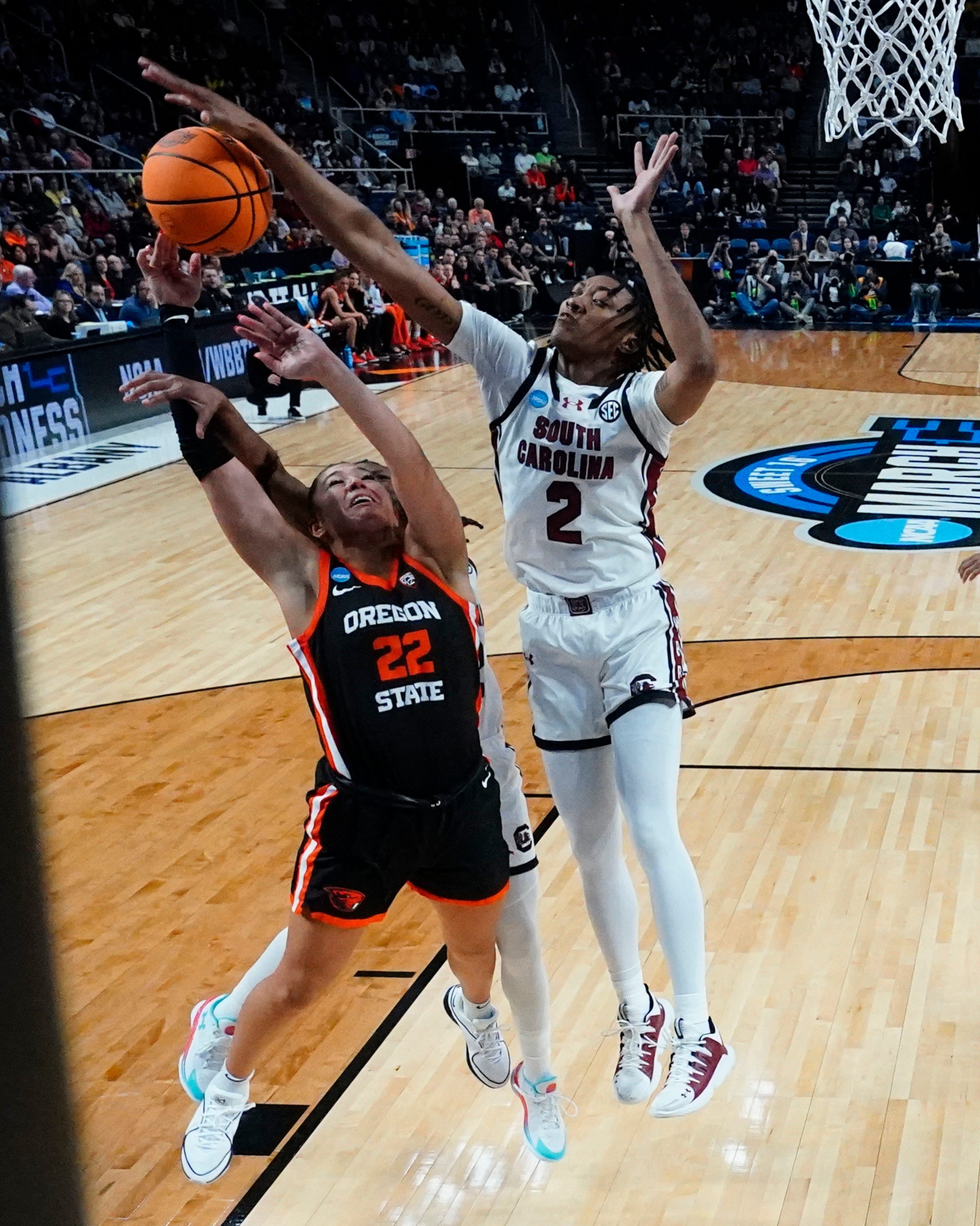 Mar 31, 2024; Albany, NY, USA; South Carolina Gamecocks forward Ashlyn Watkins (2) blocks a shot against Oregon State Beavers guard Talia von Oelhoffen (22) during the first half in the finals of the Albany Regional of the 2024 NCAA Tournament at MVP Arena.