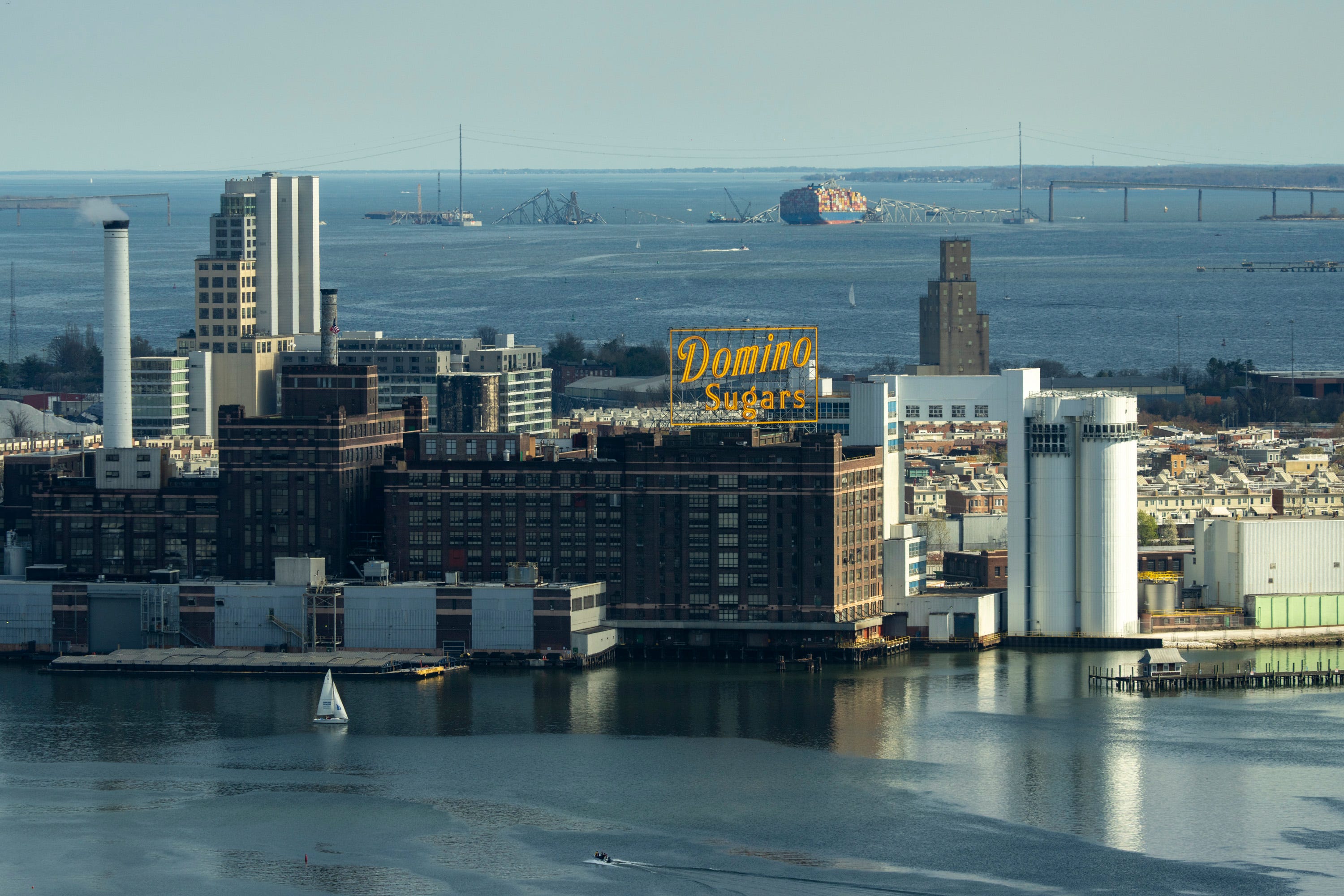 A large salvage operation is underway at the wreckage of the Francis Scott Key Bridge, a major span over the Patapsco River in Baltimore that collapsed after it was struck by a Singapore-flagged container ship 'Dali'.