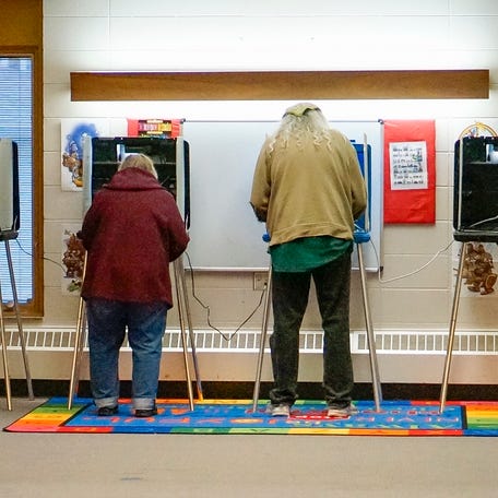 Voters nearly fill all the booths at the First United Lutheran church poll, Tuesday, April 2, 2024, in Sheboygan, Wis.