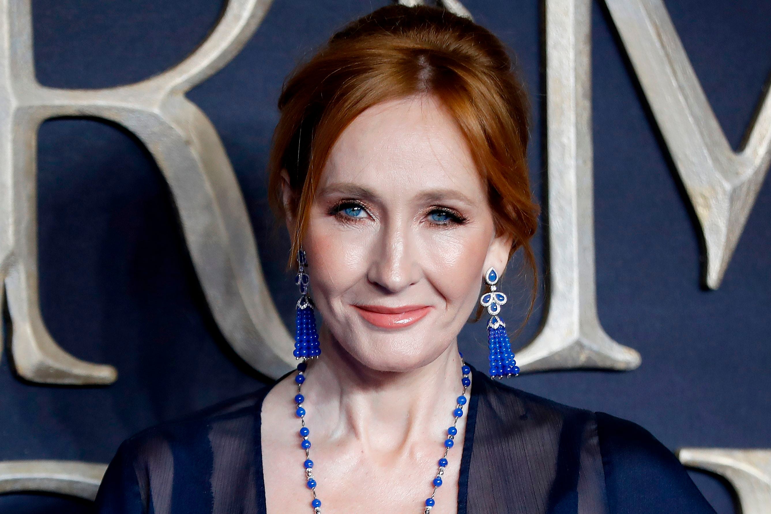 British author and screenwriter J.K. Rowling poses upon arrival to attend the UK premiere of the film 'Fantastic Beasts: The Crimes of Grindelwald' in London on November 13, 2018.
