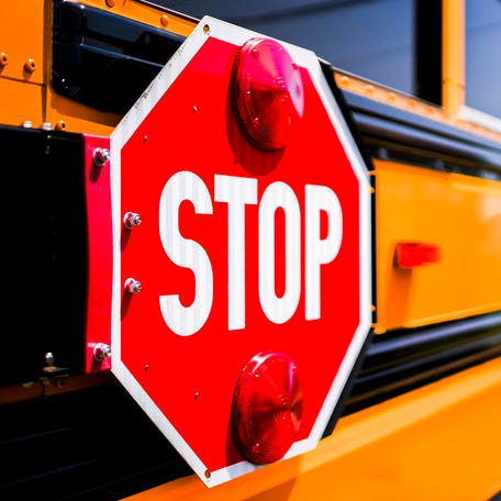 Stop sign on school bus with selective focusing