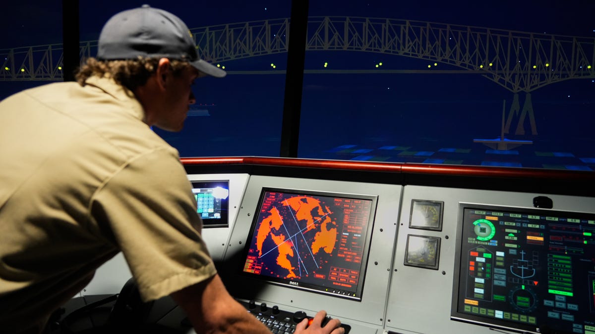 Kyle Soukup, a third class cadet at California State University Maritime Academy, monitors a screen onboard a simulator. The campus has two 360-degree, full-mission simulators on campus that allow students to practice emergency or routine scenarios in preparation for what they will encounter when they enter their professions full-time.
