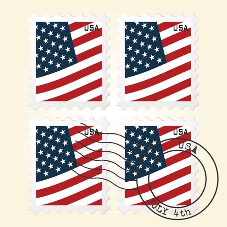A collection of postage stamps with the American flag.