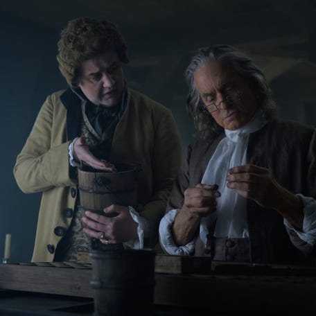 Michael Douglas as Franklin (right) with his trusted compatriot Edward Bancroft (left, played by Daniel Mays), who also happens to be a British double agent.