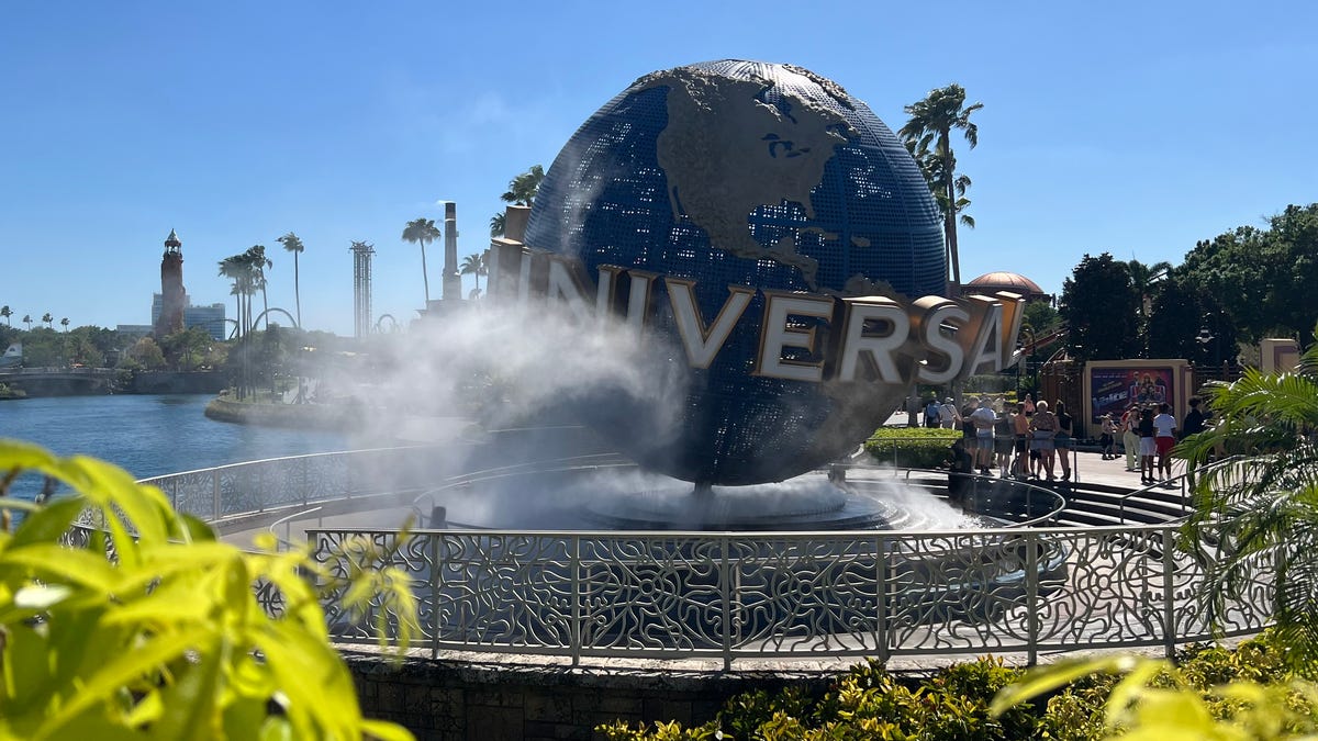 Universal Studios' iconic globe spins outside of Universal Studios Florida.